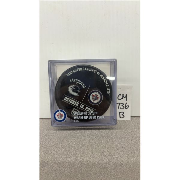 Officials Winnipeg Jets vs Vancouver Canucks Warm up Puck