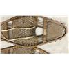 Image 10 : Two Pairs of Traditional Wooden Snowshoes with Rawhide Webbing and Red Pompom Accents