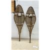 Image 7 : Two Pairs of Traditional Wooden Snowshoes with Rawhide Webbing and Red Pompom Accents