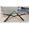 Image 1 : Modern Glass Top Kudney Shaped Coffee Table with Wood Crossed Base, Approx 20 x 53 x 28"
