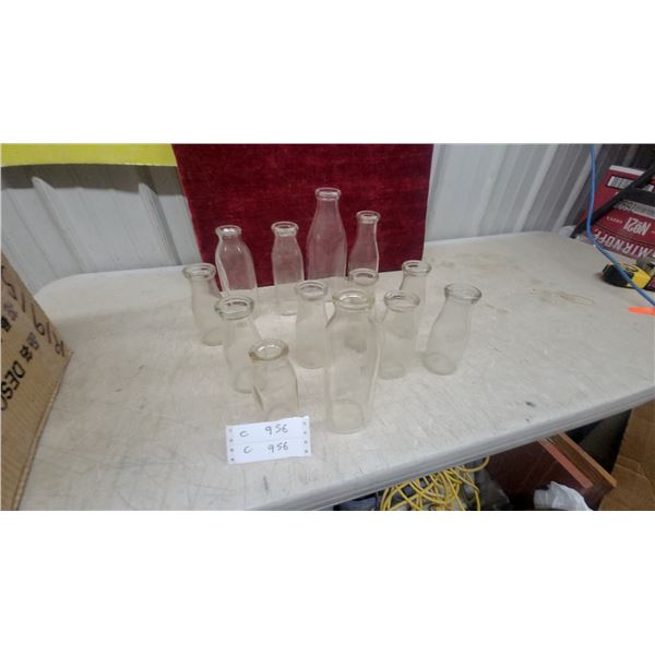 Collection of Vintage Clear Glass Milk Bottles, Various Sizes