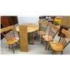 Image 1 : Oak Round Dining Table with Leaf and Four Spindle Back Chairs