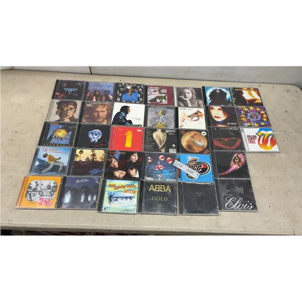 Collection of Classic Rock and Pop CDs Including Deep Purple, Van Halen, the Cars, and More