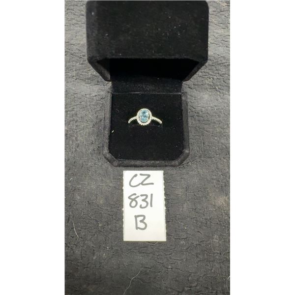1.0 Carat Oval Cut Swiss Blue Topaz Ring in 925 Sterling Silver with White Gold Overlay Resizeable