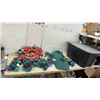 Image 1 : Christmas Décor Lot: Decorated Garland, String Lights, Tree Stands, Spotlight, and Scepter Storage