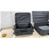 Image 11 : Two Black Rolling Suitcases