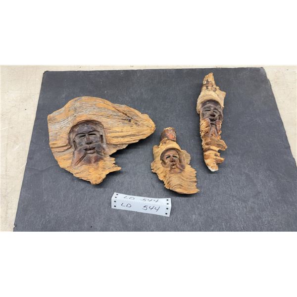 Set of Three Carved Wooden Face Sculptures on Natural Driftwood, Largest 12"