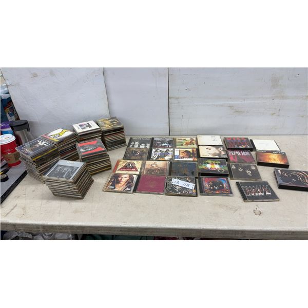 Large Collection of Rock and Pop Music CDs Including Queen, Kiss, Pearl Jam, Roxette, and More