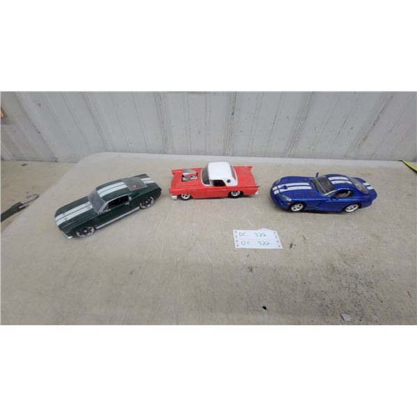 Three Die-Cast Model Cars: Shelby GT500, 1959 Cadillac Eldorado Biarritz, and Dodge Viper GTS 1/18