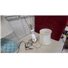 Image 6 : Red Velvet Tufted Ottoman, Cowboy Boot Vase Blue Glass Lamp, and More