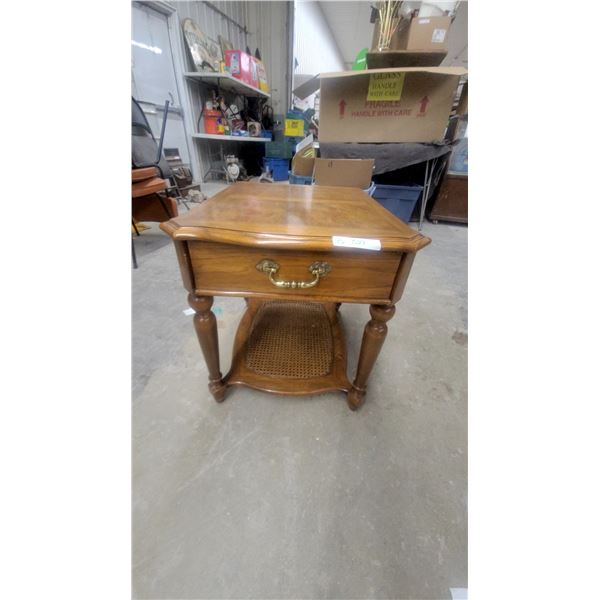 Traditional Oak End Table with Burl Veneer Top, Brass Pull, and Cane Lower Shelf 23 x 21 x 26"