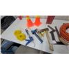 Image 3 : Orange Traffic Cones, Caulk Guns, Hatchet, Screwdrivers, Extension Cord, Yellow Rope, and More