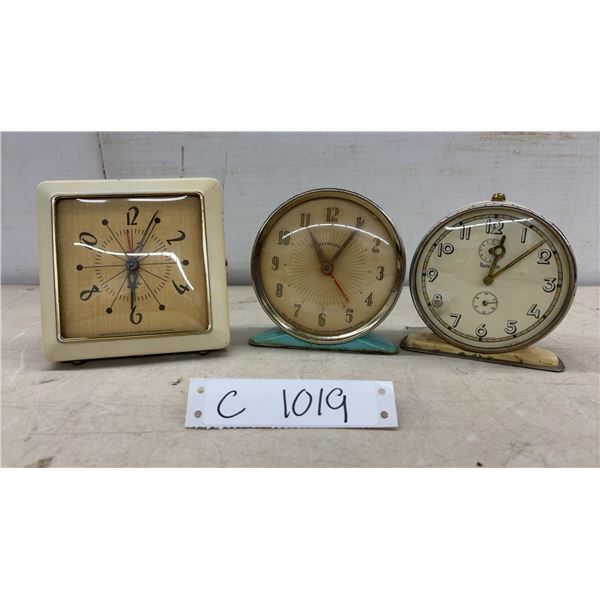 Lot of 3 Vintage Alarm Clocks: Westclox Wristlet, Westclox America, and Hanson