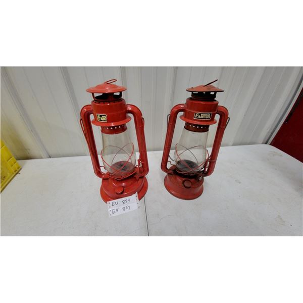 Two World Famous Red Hurricane Oil Lanterns