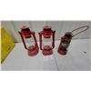 Image 1 : Three Red Cold-Blast Kerosene Lanterns