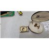 Image 5 : Smith & Wesson Handguns, Winchester, and Varmint Hunters Association Belt Buckles and More