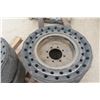Image 2 : 4 Solid Rubber Tires on 8-Hole Rims