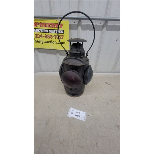 Antique Four-Lens Railroad Switch Lamp with Red Lenses and Bail Handle