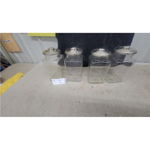 Set of Four Clear Glass Square General Store Canisters with Silver Metal Lids