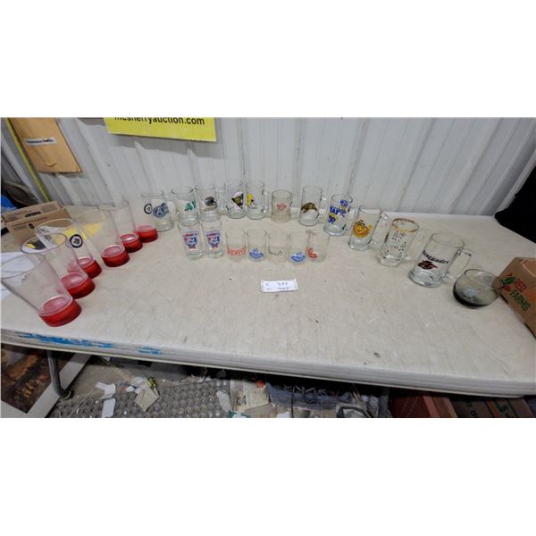 Collection of CFL Team Glass Mugs, Beer Brand Glasses, Shot Glasses, and Wpj Jets