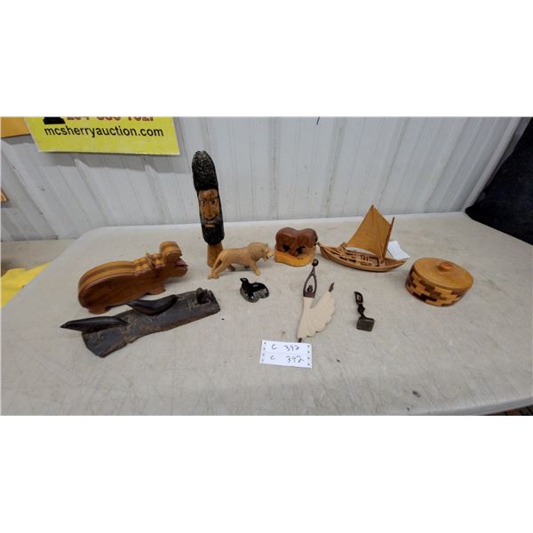 Carved Wooden Hippopotamus, Sailboat Model, Elephant Seals Figurines, and More