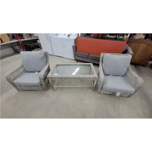 Three-Piece Gray Wicker Patio Set with Cushions and Glass-Top Coffee Table