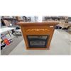 Image 1 : Electric Fireplace Mantel with Cherry-Tone Wood Cabinet and Decorative Carved Scrollwork with