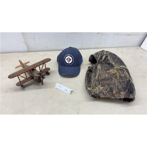 Wooden Model Biplane, 4 1/4 x 11 1/2 x 10 1/2", Winnipeg Jets Baseball Cap, and Camouflage