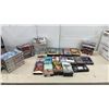 Image 1 : Collection of 46 War VHS Movies: Patton, Catch-22, The Mission, El Cid, and 2-Sided Schwarzenegger