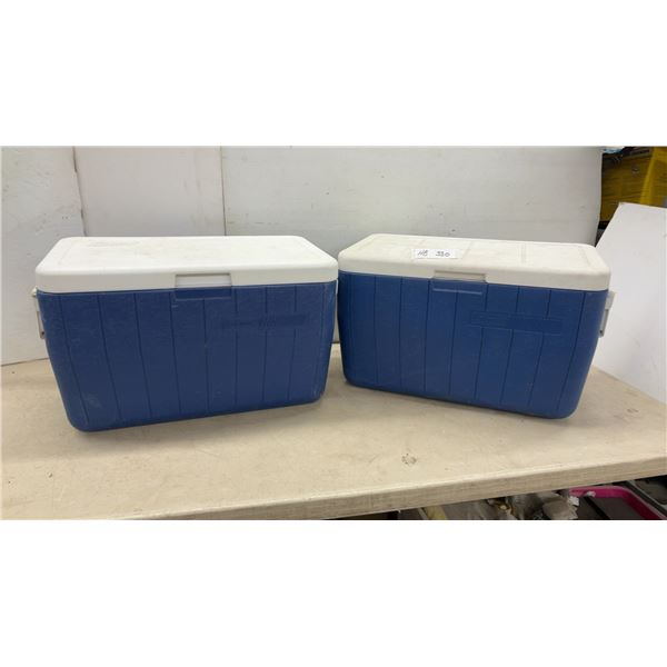 Two Coleman Blue and White Hard-Sided Coolers with Swing-Up Handles and Drain Plugs