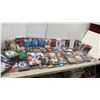Image 1 : Large Collection of DVDs Including Jaws, Caddyshack, Hugo, Baywatch, and More
