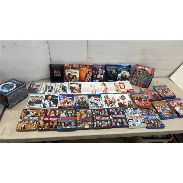 Collection of DVD Box Sets Including Grey's Anatomy, Big Bang Theory, Stargate, and More