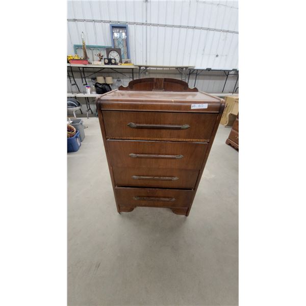 Art Deco Waterfall Style Four-Drawer Chest with Decorative Crest, Circa 1930s-1940s 46 x 32 x 18"
