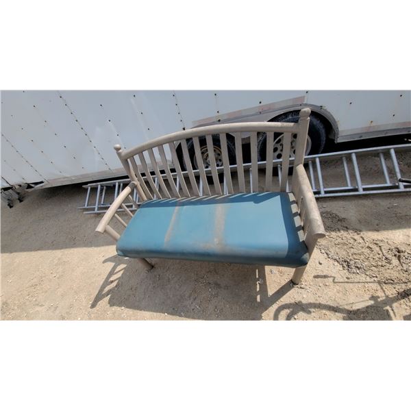 Outdoor Bench with Curved Slatted Backrest, Armrests, and Light Blue Cushion 50" Wide