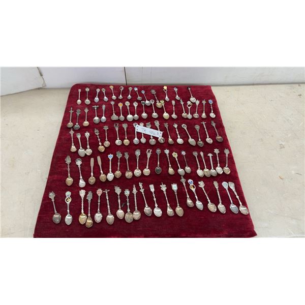 Collection of Souvenir Spoons from Various Locations and Events