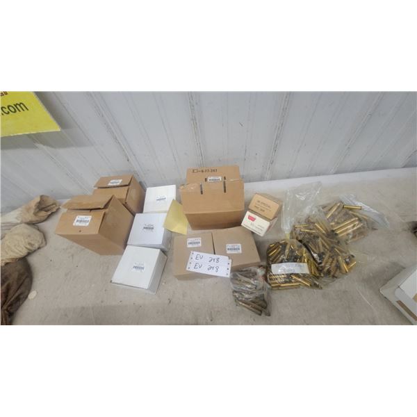 Assorted Ammunition and Brass Casings Including 35 Wheelen 32-20 375 H+H .38 Special, .30 Carbine