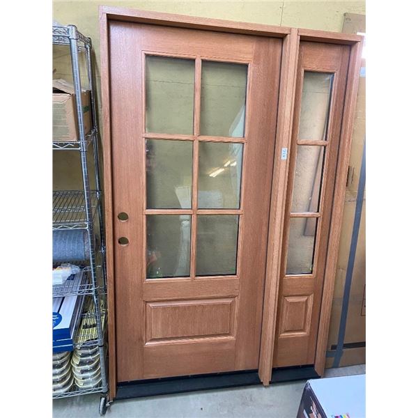 53X82 INCH EXTERIOR DOOR - HAS CRACK ON TOP LEFT FRAME