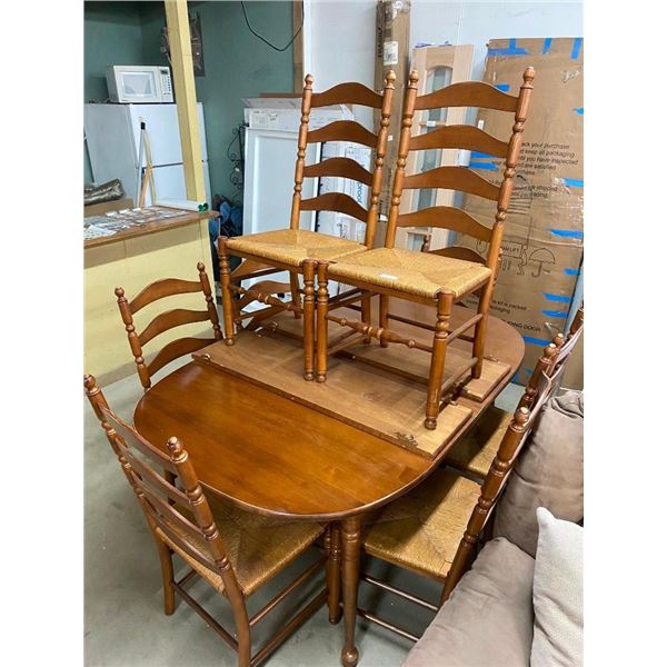 6 FT TABLE WITH 2 LEAFS AND 8 CHAIRS