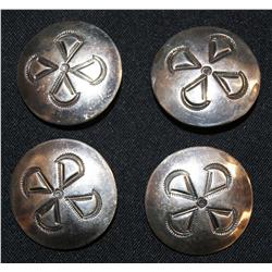 four Navajo buttons