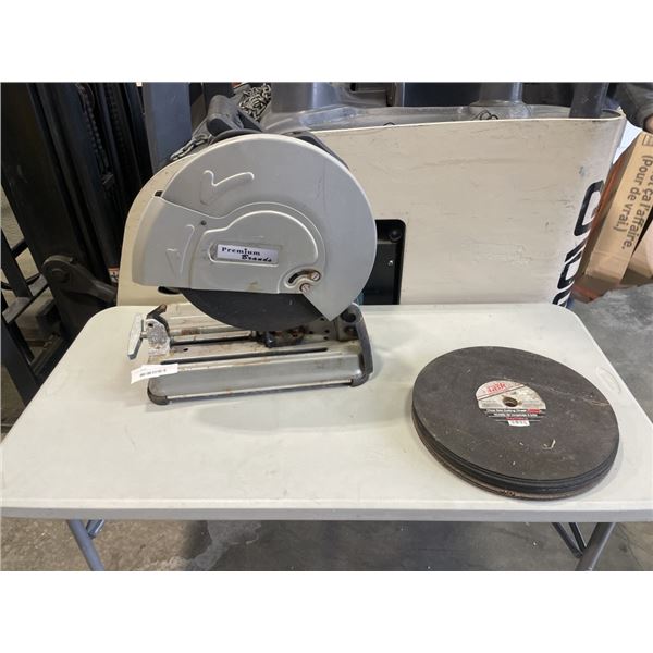 PREMIUM BRANDS CUT OFF SAW AND STACK OF REPLACEMENT CUT OFF DISCS