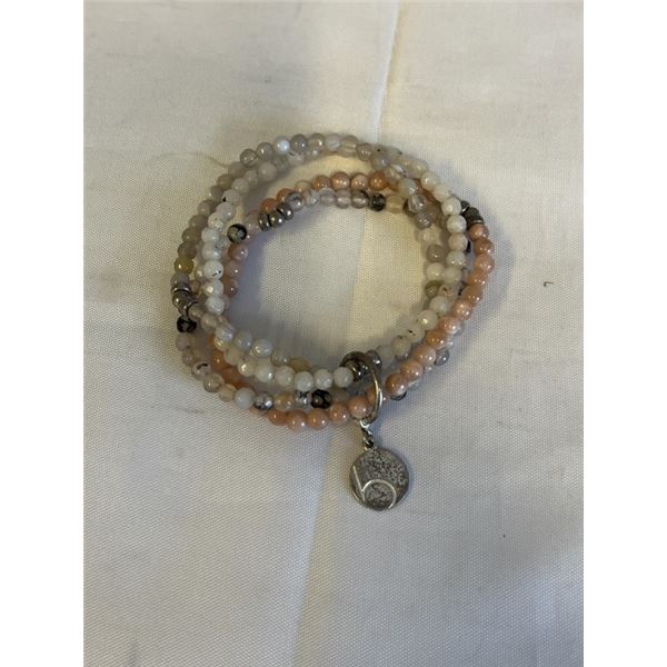 4 STRANDS OF SEMI PRECIOUS STONE BEADS BRACELET W/ STERLING SILVER CHARMS