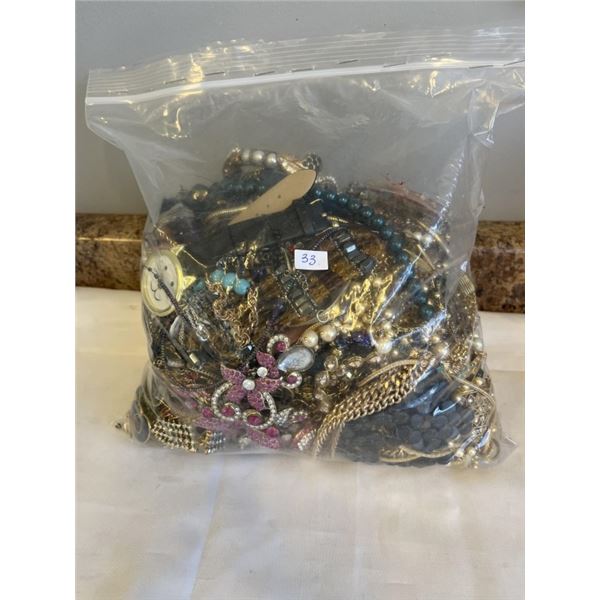 HEAVY LARGE BAG OF VARIOUS JEWELRY AND PARTS