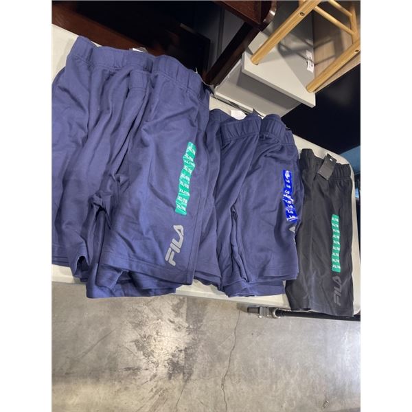 8 PAIRS OF FILA TRAINING SHORTS. 3 LARGE AND 5 XL