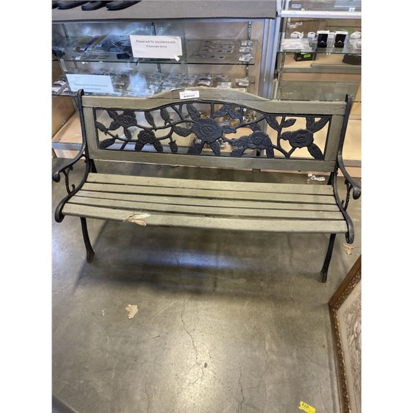 CAST IRON GARDEN BENCH, ONE BOARD IS BROKEN