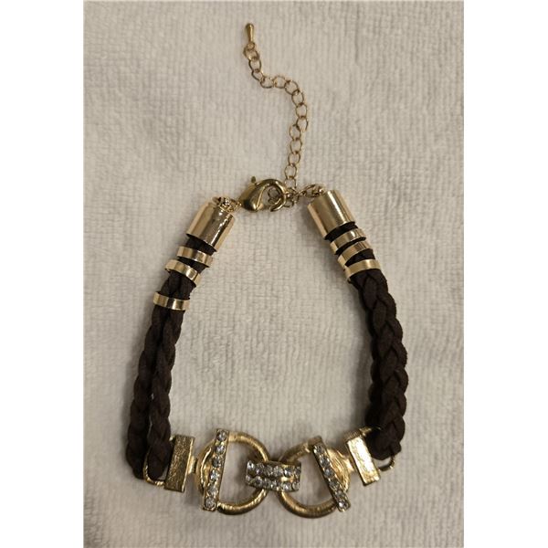 02 - Brown braided leather bracelet with gold tone metal and rhinestones. 7" bracelet with adjustabl