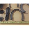 Image 3 : Various types of antique farrier and blacksmith tools, including several horseshoes and cobbler's sh