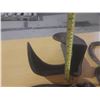 Image 4 : Various types of antique farrier and blacksmith tools, including several horseshoes and cobbler's sh