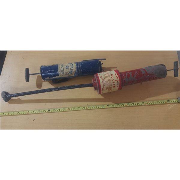 Vintage Watkins duster sprayers.