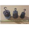 Image 1 : Vintage cast iron hanging scale weights.