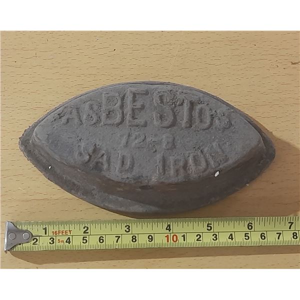 Vintage Asbestos Sad Iron, likely dating from the late 19th century.
